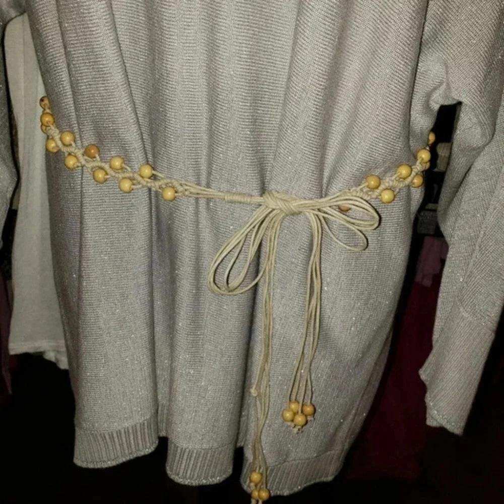 Beaded belt with tassels in‎ cream